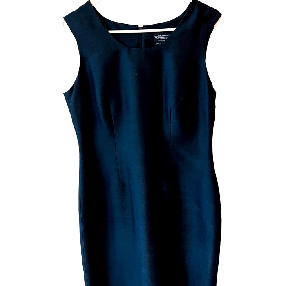 The J. Peterman black silk dress size 10 beautiful fit and condition